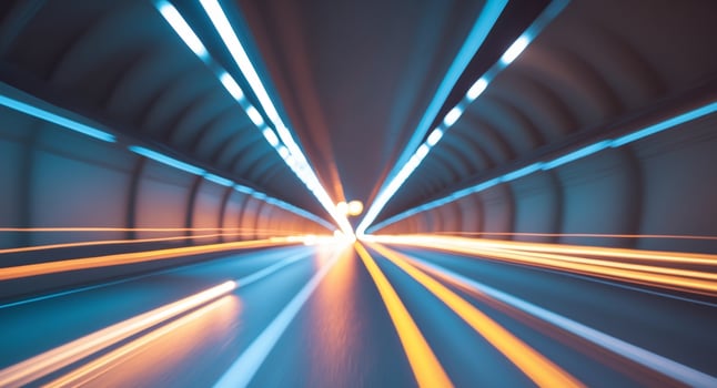 Tunnel roadway with streaks of car lights photo