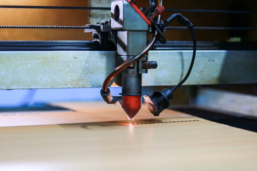 CNC laser cutting machine, close-up. Laser cutting of wood. photo