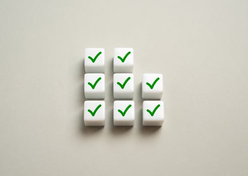 Check marks for completed work, achievements and completed stages. Completed objectives. Workflow optimization. Tracking system, project management. Performance recognition photo