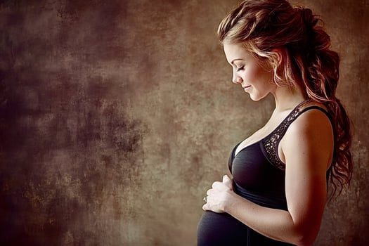 Pregnant woman holding belly, expecting mother with hands on stomach photo