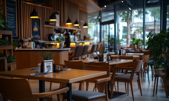 Modern cafe interior, warm ambiance, spacious dining area photo