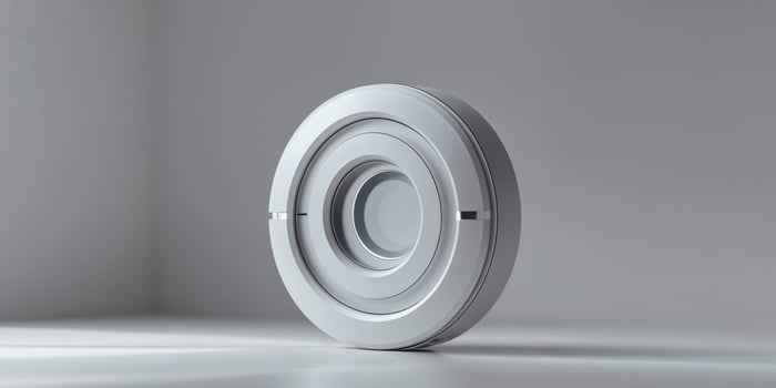 A white circular object on a table photo