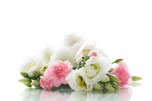 Gift bouquet.Delicate composition of white and pink flowers, isolated on white background photo