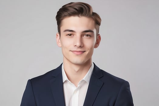 A young man in a suit and white shirt photo