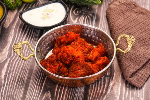A bowl of food sitting on a table photo