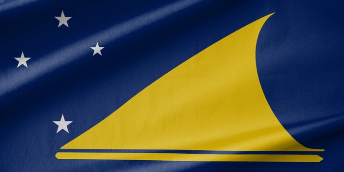 Tokelau National Flag Waving in the Wind photo