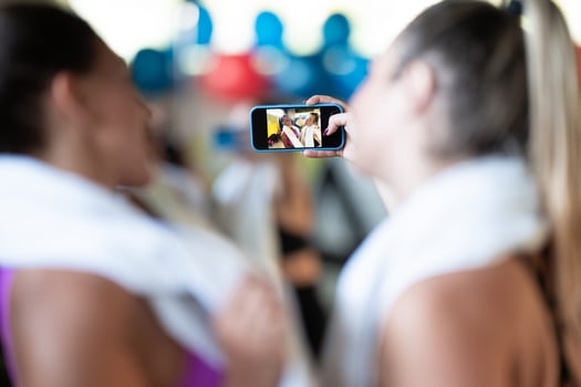 Two fitness women posing for a photoshoot after an intense workout, capturing their strength, determination, and fitness journey. photo