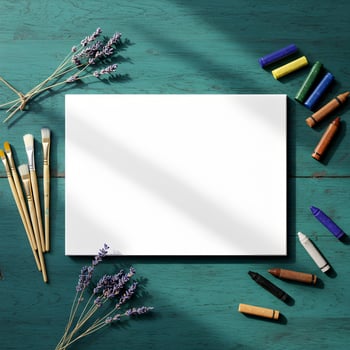 Inspirational flat lay art featuring a white canvas, assorted art supplies, and lavender flowers on a vintage turquoise wood background, perfect for creativity and mockups photo