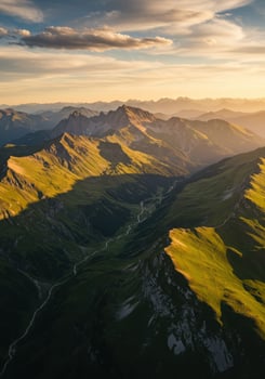 Breathtaking aerial view of a vibrant green mountain range bathed in warm sunset light. photo
