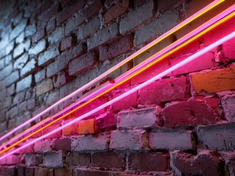 Neon neon lights on a brick wall photo