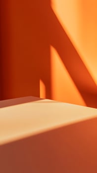 Orange Wall with Angled Surface and Shadows photo