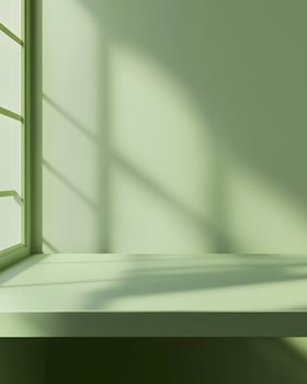 Pale Green Wall, Window, and Ledge with Sunlight Shadows photo