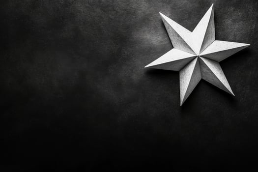 Monochrome Paper Star Origami on Dark Textured Surface photo