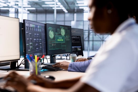 Computer scientist receives access granted notification while reconfiguring server hub, optimizing it. IT expert ensures data center workplace operates efficiently, successfully eliminating all errors photo