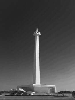 A black and white photo of a monument