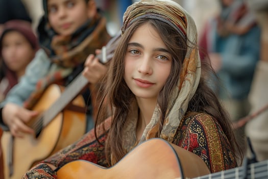 A young girl of Middle Eastern descent playing guitar, adorned in a colorful traditional outfit, surrounded by fellow musicians. photo