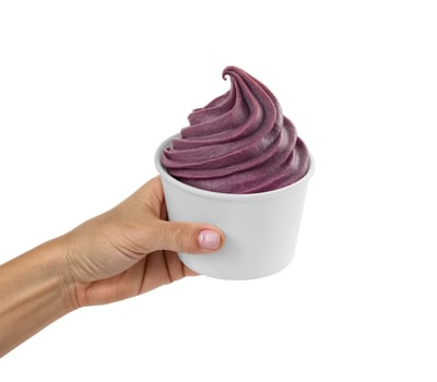Hand holding an acai bowl photo