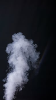 White smoke or fog isolated on black background photo