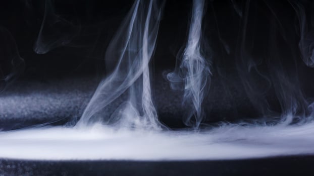 Dense fog isolated on black background photo