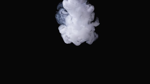 Dense white fog isolated on black background photo