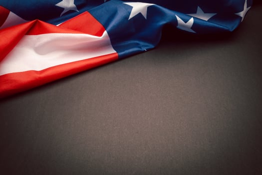 Part of the American flag is on a black background with copy space for text photo