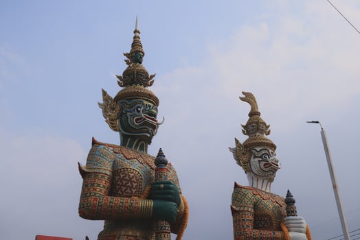 The Majestic Guardian Statues elegantly stand at the Thai Temple, showcasing artistry and culture photo