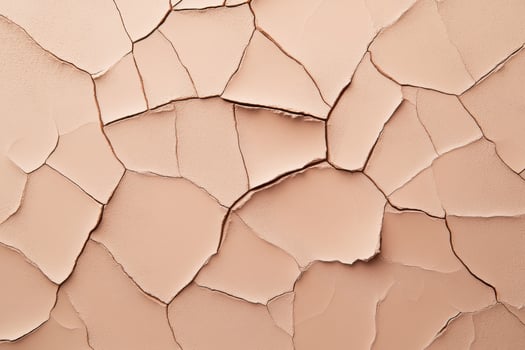 Patterns of cracked clay reveal natures artistry in textured earth tones and minimal design for creative inspiration photo