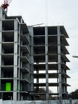 Urban construction of concrete building defining new city development photo