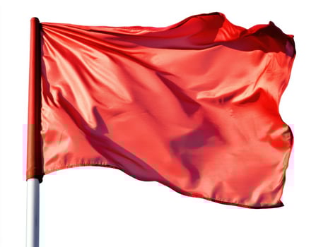 Bright red flag waving in the wind against a clear background photo