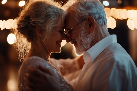 In a dimly lit nightclub, an elderly couple dances closely, their faces gently illuminated by soft golden light. The warm atmosphere embodies love and intimacy, creating a romantic moment photo