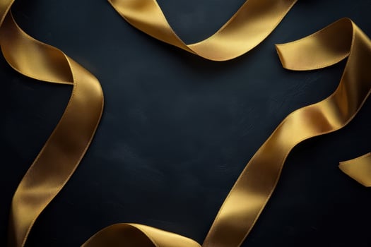 Golden Ribbons Arranged on Dark Background photo