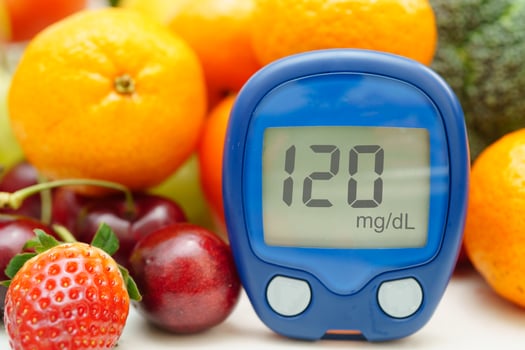 Digital glucose meter food for check sample blood sugar level to treatment diabetes with vegetable and frui photo