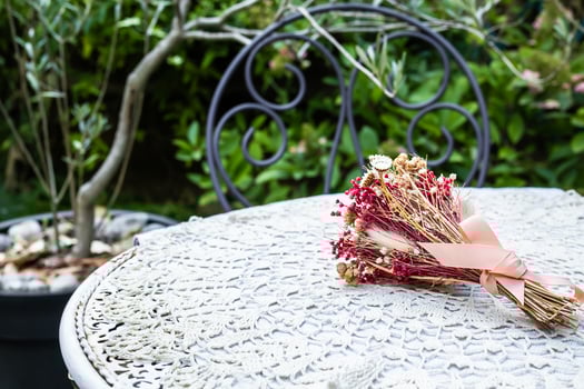 Bouquet of herbs on a garden table photo