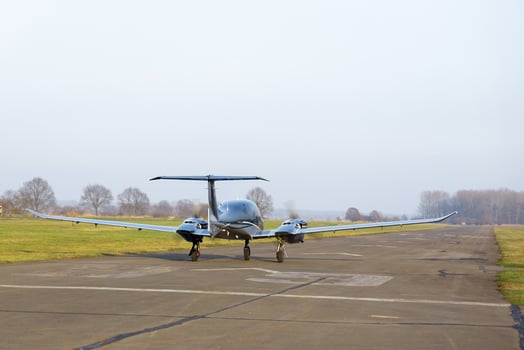 small plane on the runway photo
