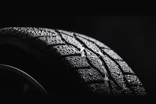 Capturing the essence of a wet tire in dim light. photo