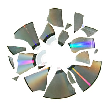 Broken CD over white photo