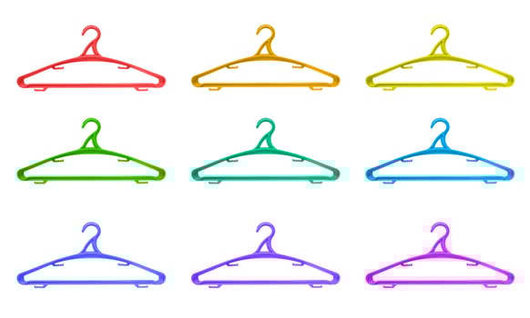 Multicoloured hangers over white photo