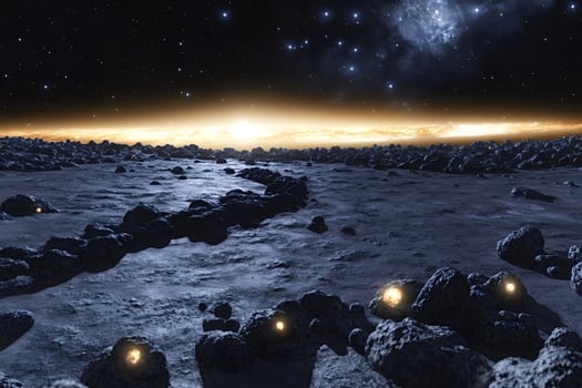 Glowing rocks on an alien planet under a distant sun photo