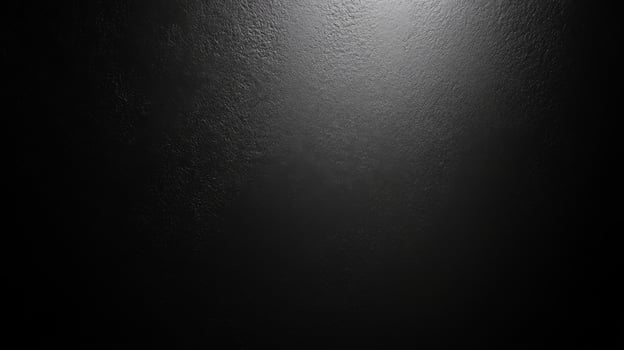 Minimalist Dark Textured Surface With Subtle Light Focus photo