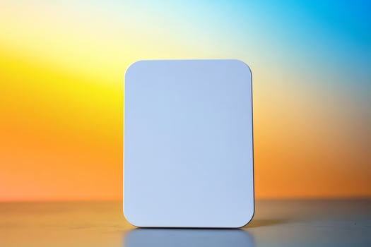 Minimalist tablet on a serene sunset backdrop inspires creativity. photo