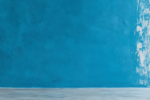Textured teal wall with light grey floor photo