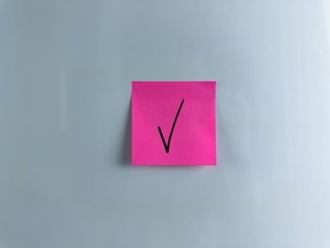 Indicating an answer with check mark photo