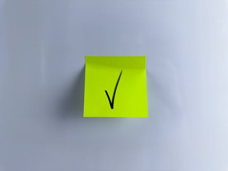 Making important decision and marking success with check mark photo