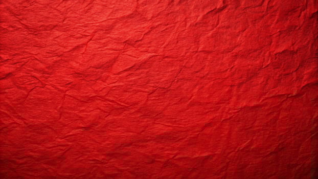 A red crumpled paper texture background photo
