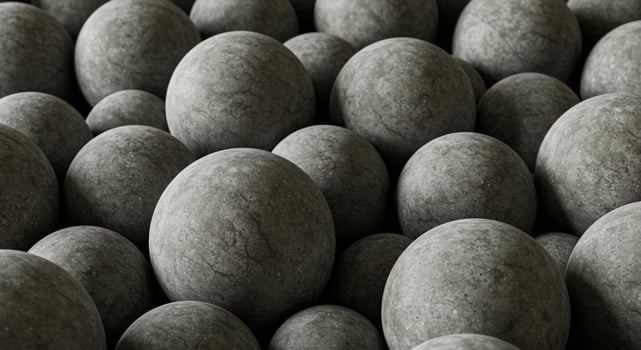 Smooth stone spheres with a textured surface photo