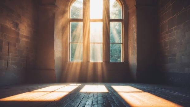 Sunlight shining through a window in an old building photo