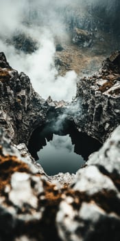 Steam rises from volcanic crater with reflective water in eerie landscape photo