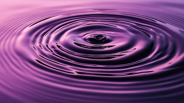 Purple liquid with concentric ripples from a drop photo