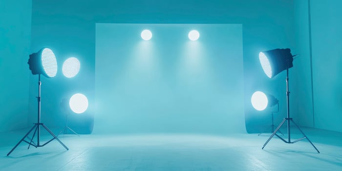 Studio Lighting Setup with Led Panels and Misty Blue Background photo