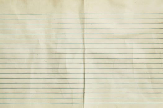 Old paper lined with blue lines photo